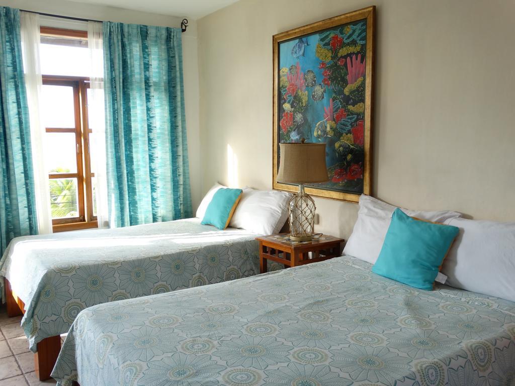 Hotel y Restaurante Cesar Mariscos Tela Habitación foto